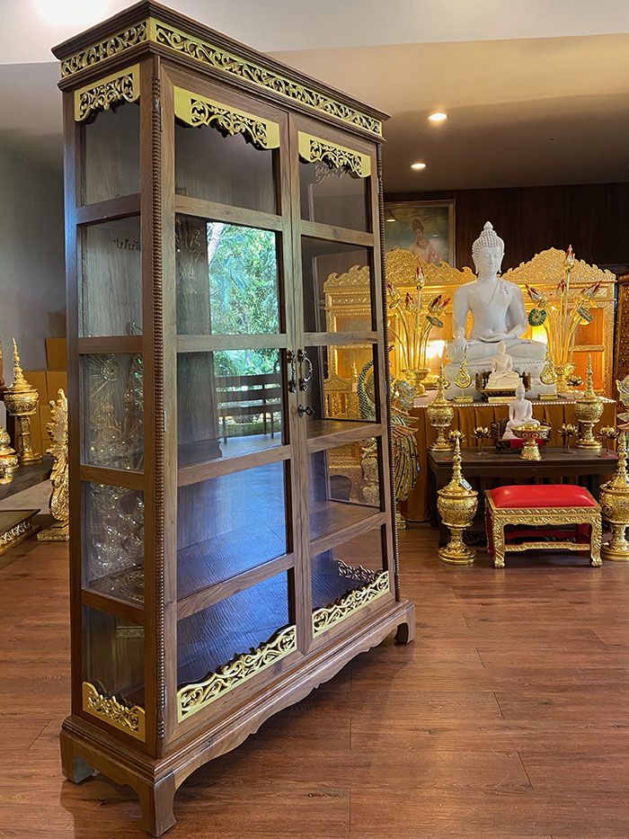 ตู้พระไตรปิกไม้สักทั้งหลัง สำหรับใส่พระไตรปิฎก 91 เล่ม ราคา18900 บาท